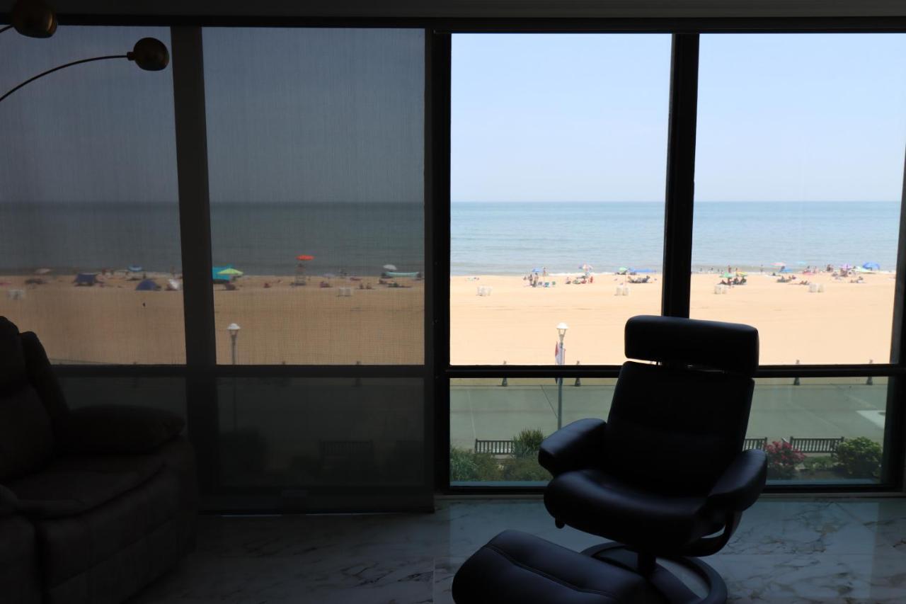 Oceanfront Beach, Sky, & Dolphins