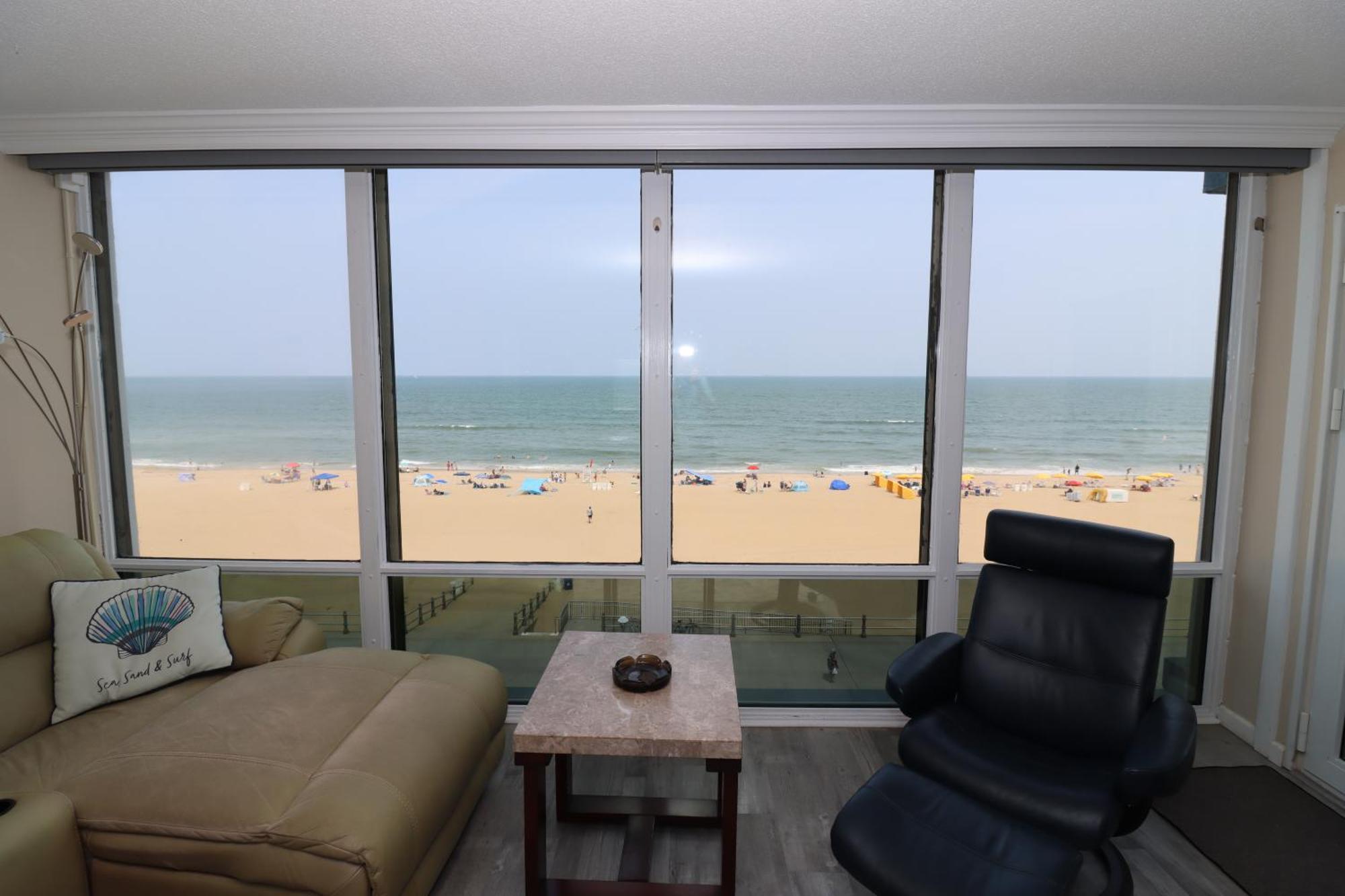 Oceanfront Beach, Sky, & Dolphins